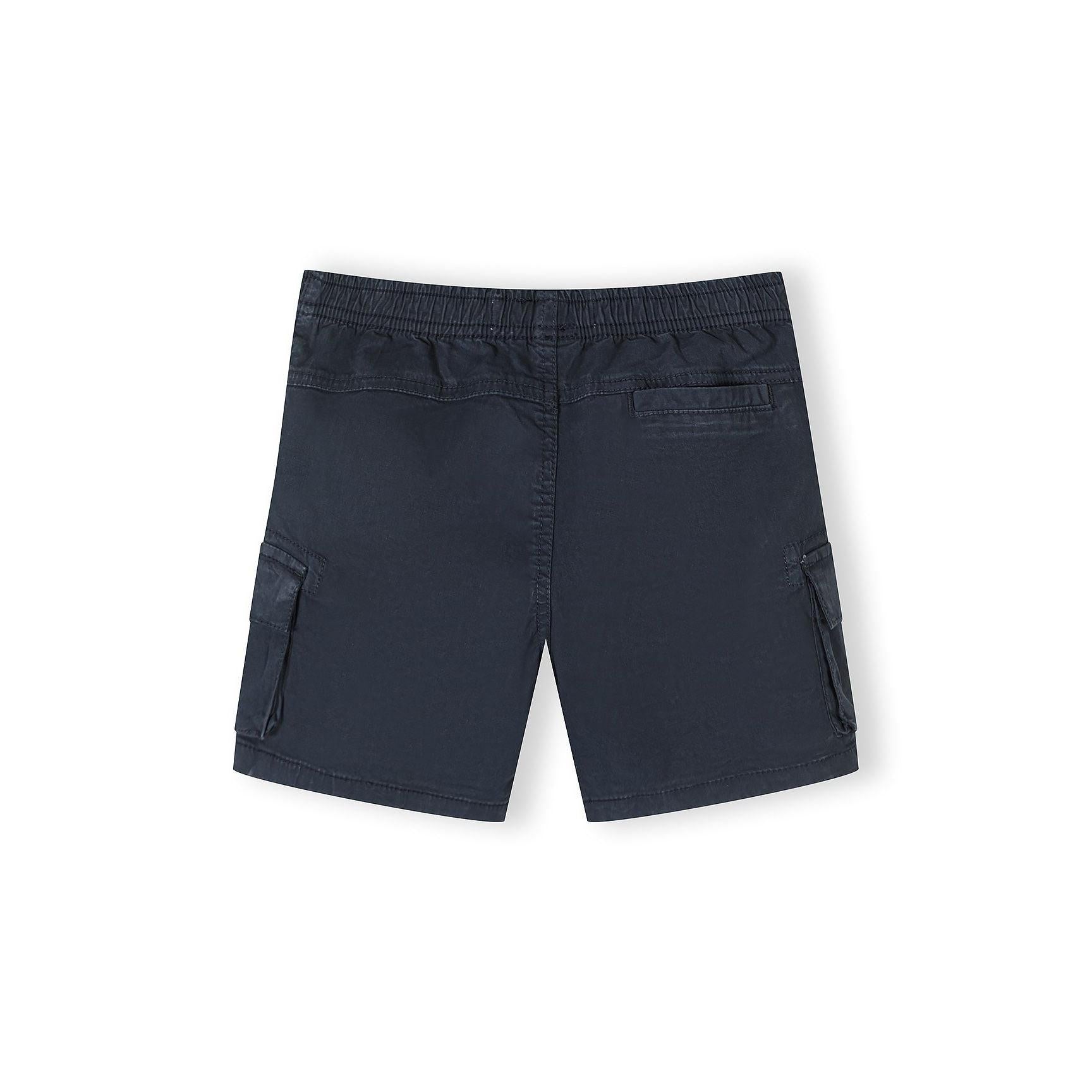 Single beige cargo shorts laid flat showing front view with drawstring waist, side pockets and cargo pocket details