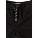 Detail shot of black combat shorts waistband showing elastic waist with black and white striped drawstring cord and metal eyelets