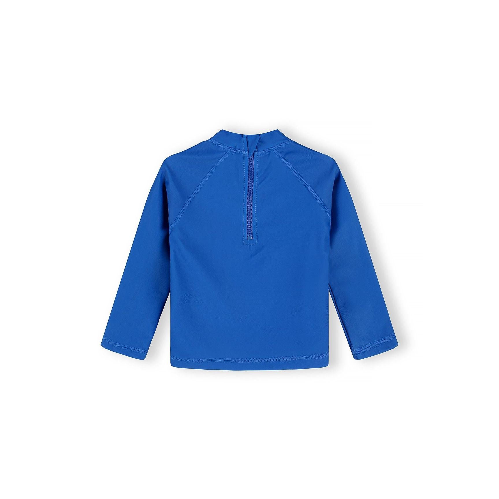 Close-up of light blue shorts with orange crab pattern and blue waistband on white background