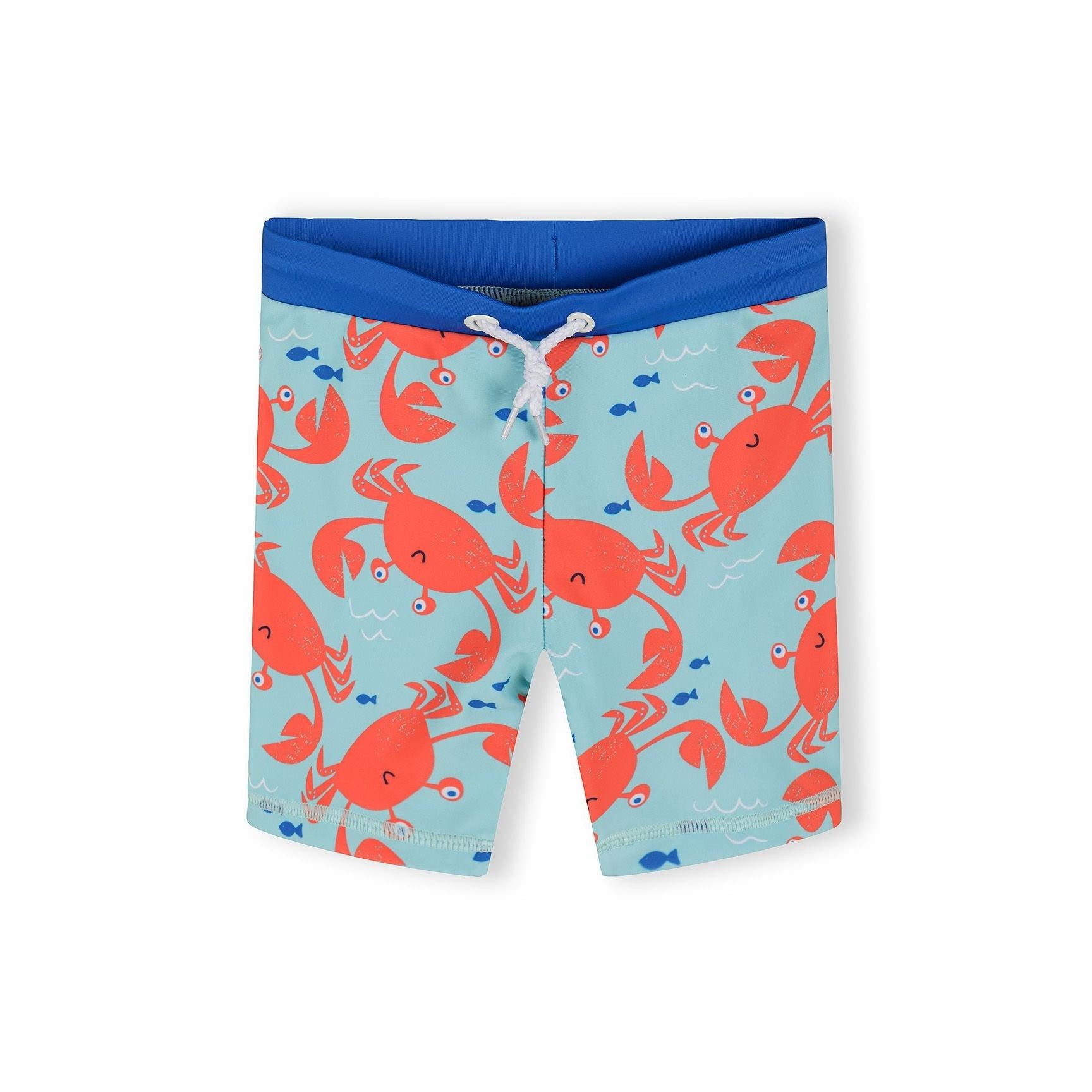 Close-up of light blue shorts with orange crab pattern and blue waistband on white background