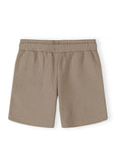 Boys shorts in muted sand with elasticated waistband and side pockets, front view.