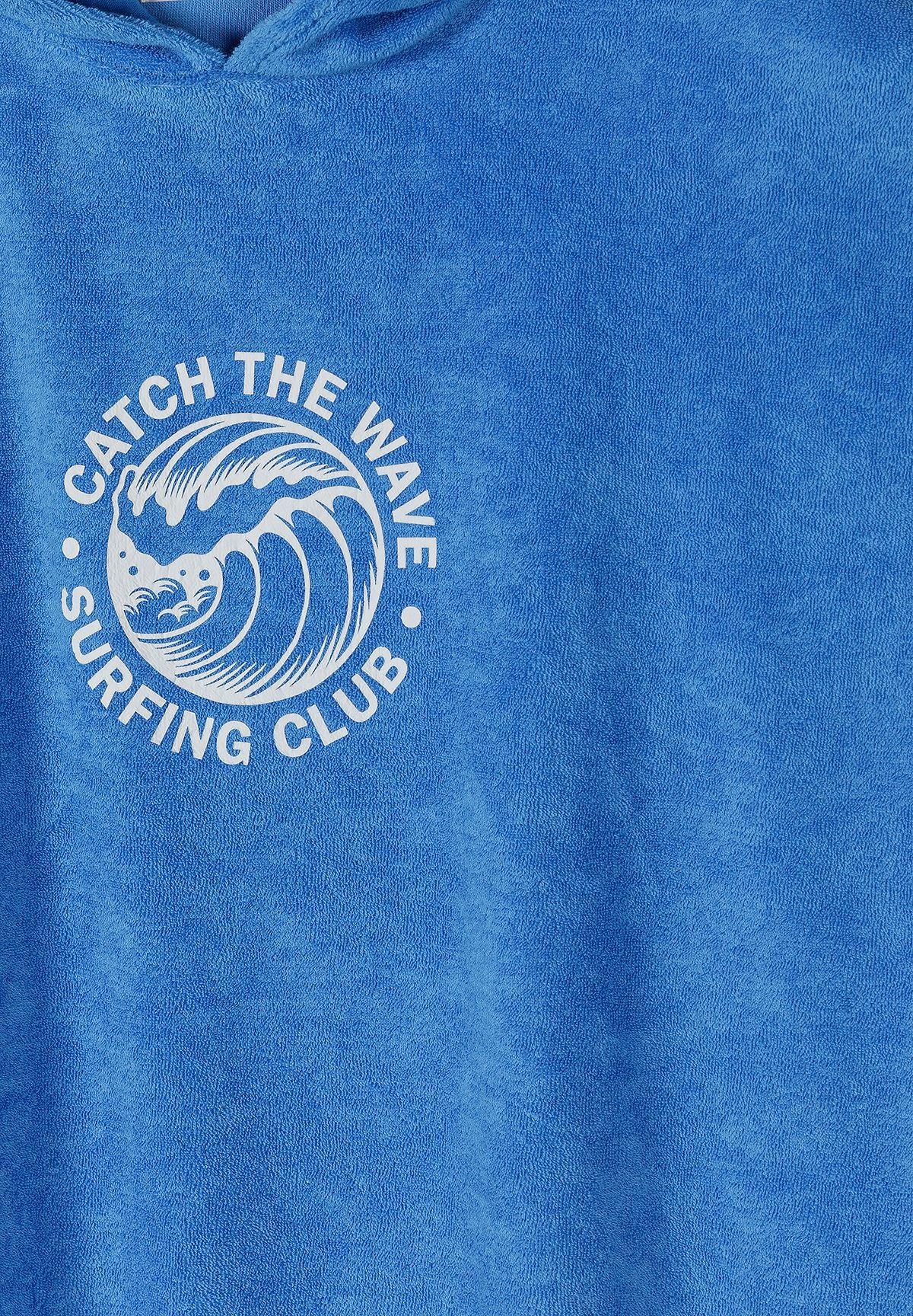 Close-up of a blue hooded cover up for boys, featuring a wave logo and long sleeves.