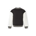 Close-up detail of black jacket showing white ribbed side pocket trim and construction