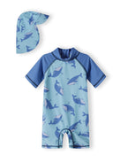 Blue short sleeve sunsuit and hat set featuring a unique whale print design for babies and kids.