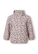 Girls softshell jacket in pink with black spots, front view, features full-length zip and high collar.