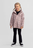Girls' softshell jacket in pink with black spots, front view, full-length zip and removable hood.