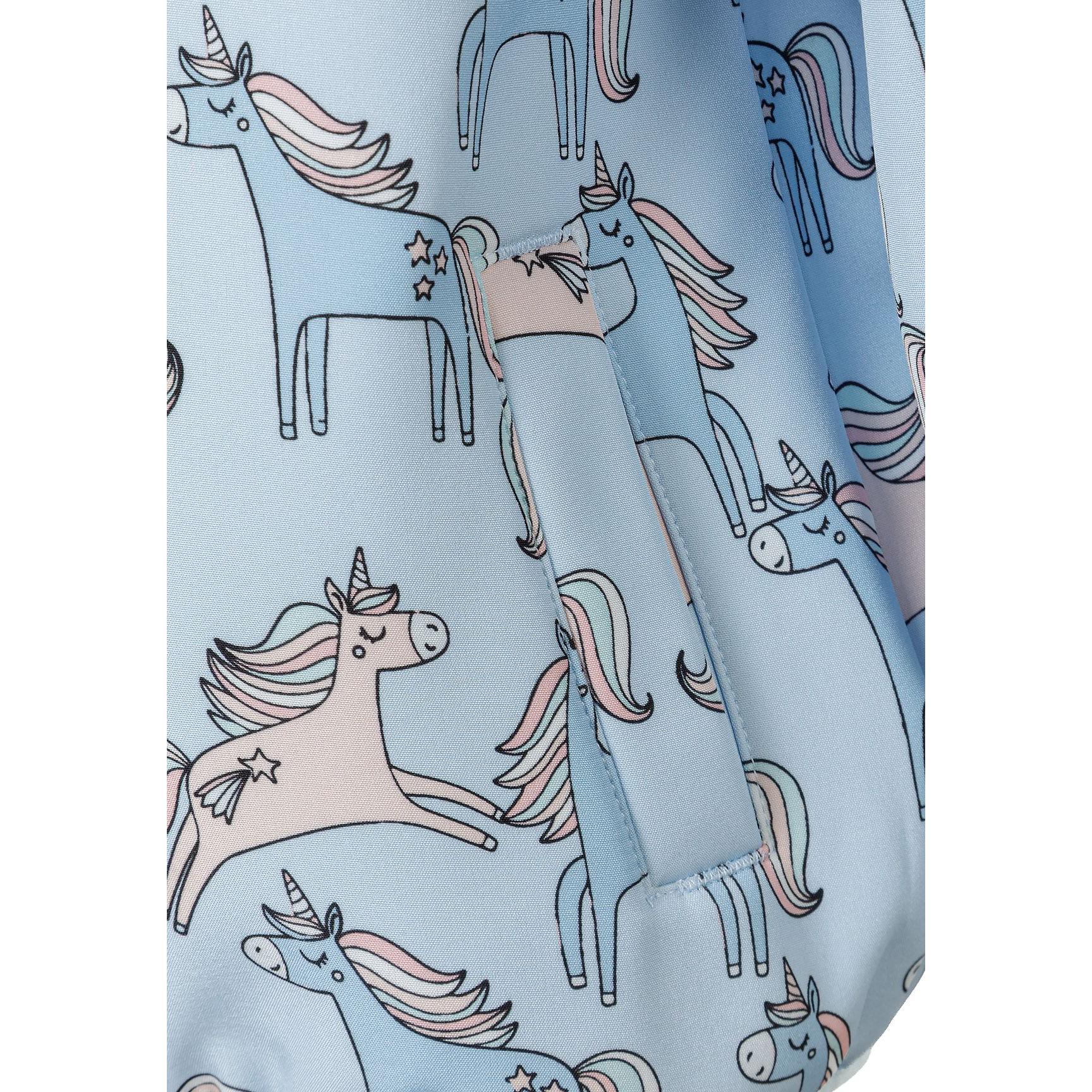 Close-up detail of light blue fabric showing unicorn print pattern with pink and white unicorns in various poses with rainbow manes and horns