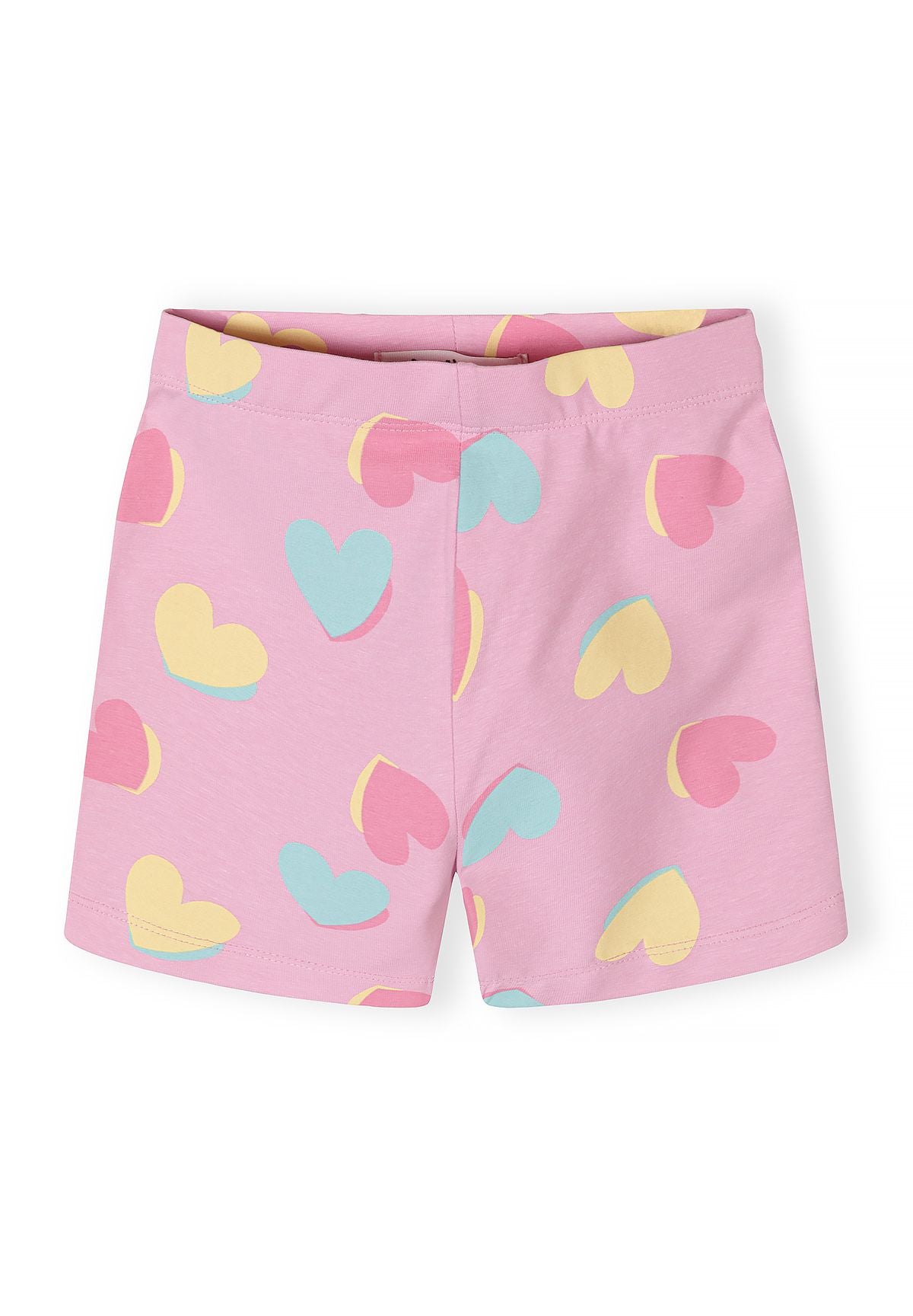 Front view of pink cycle shorts with heart prints for girls aged 12 months to 7 years.