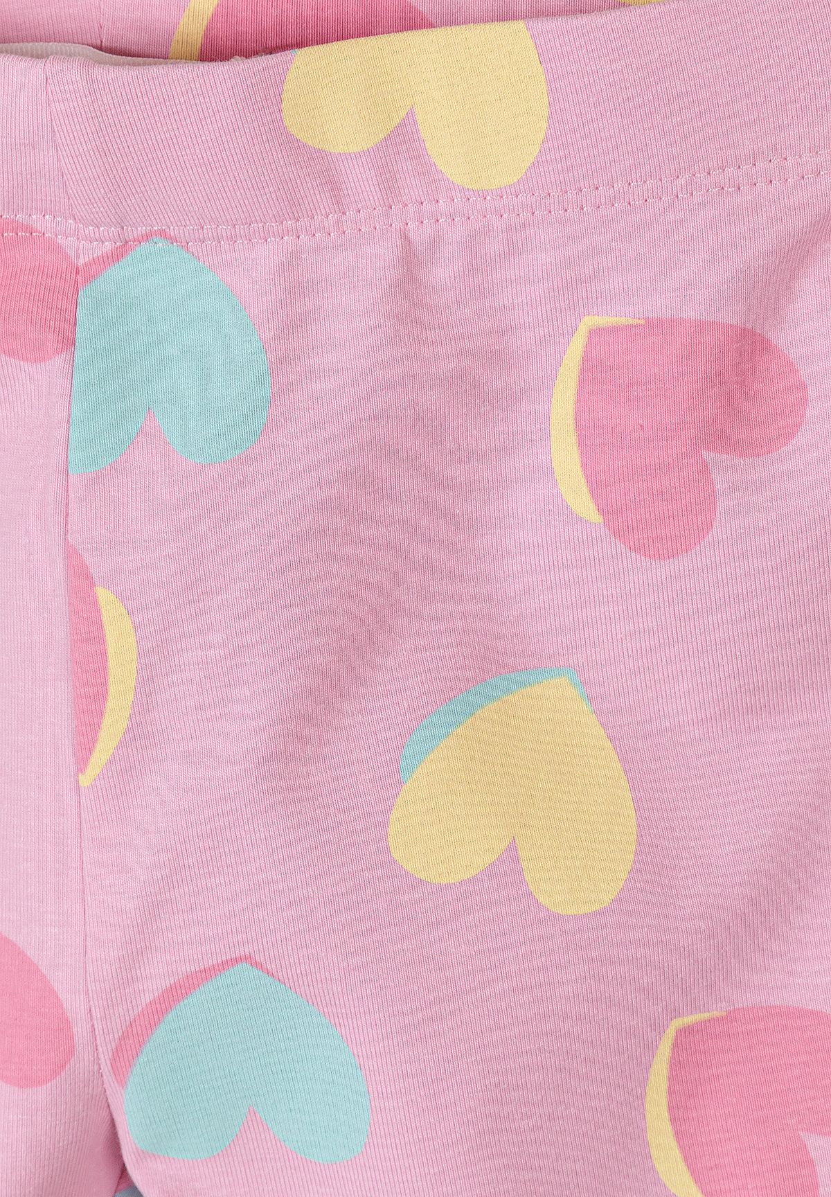 Pink, lilac, white and grey marl cycling shorts, heart print detail.
