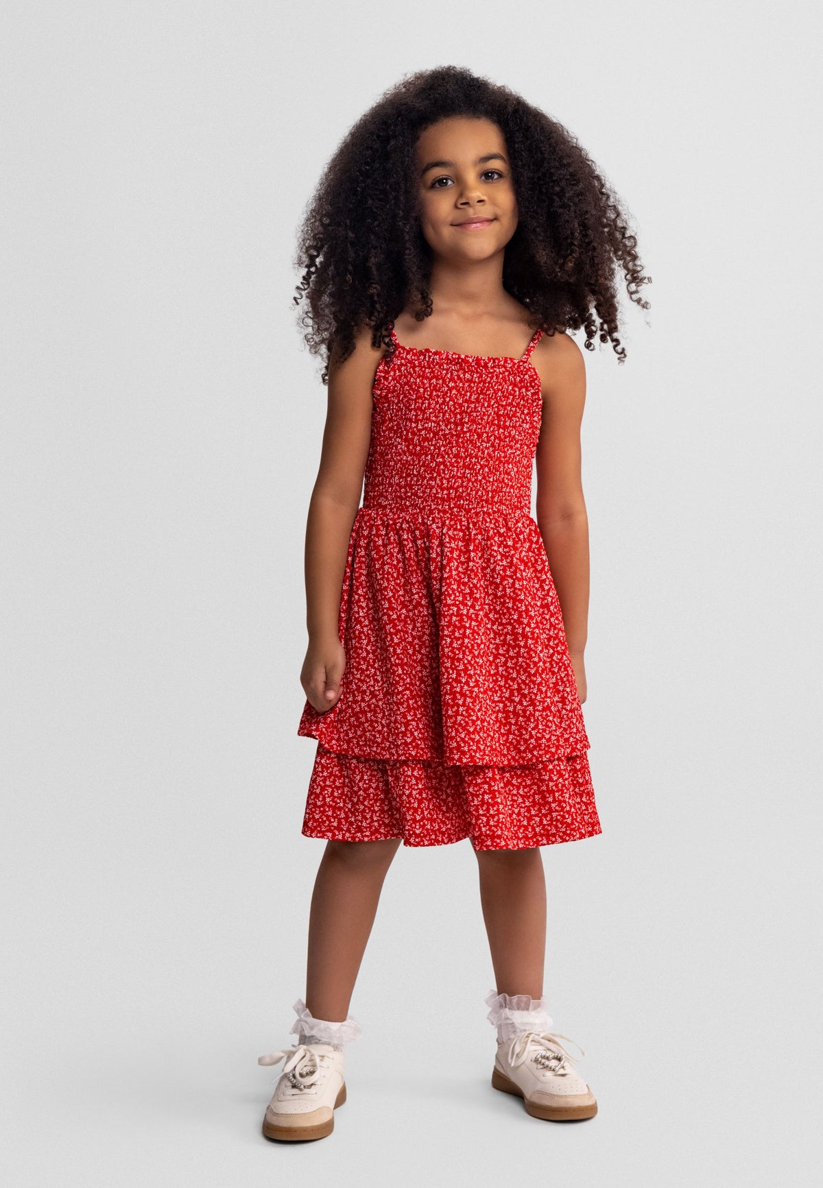 Girls red floral sleeveless summer dress with adjustable straps, tiered design.