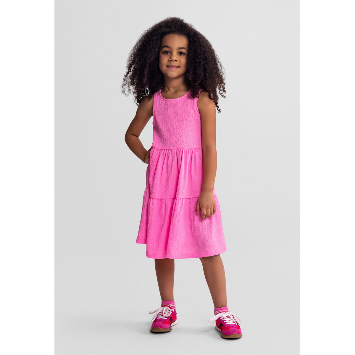 Girls' tiered bow-back sundress in pink — complete product view for square Shop card