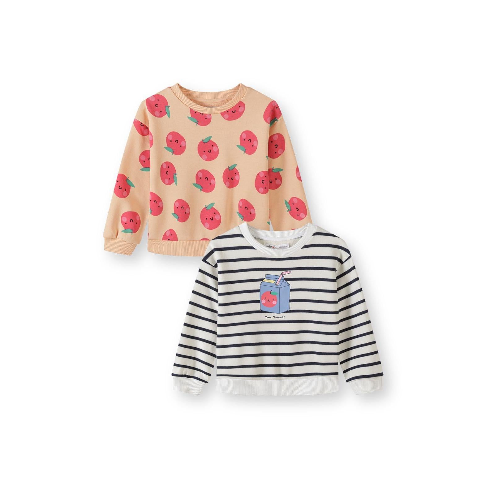 Two sweatshirts displayed on white background - apricot sweatshirt with cute apple print pattern and white striped sweatshirt with milk carton graphic featuring text 'Too Sweet'