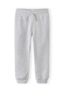 Light grey girls joggers with elastic waistband and side pockets, designed for comfortable casual wear.