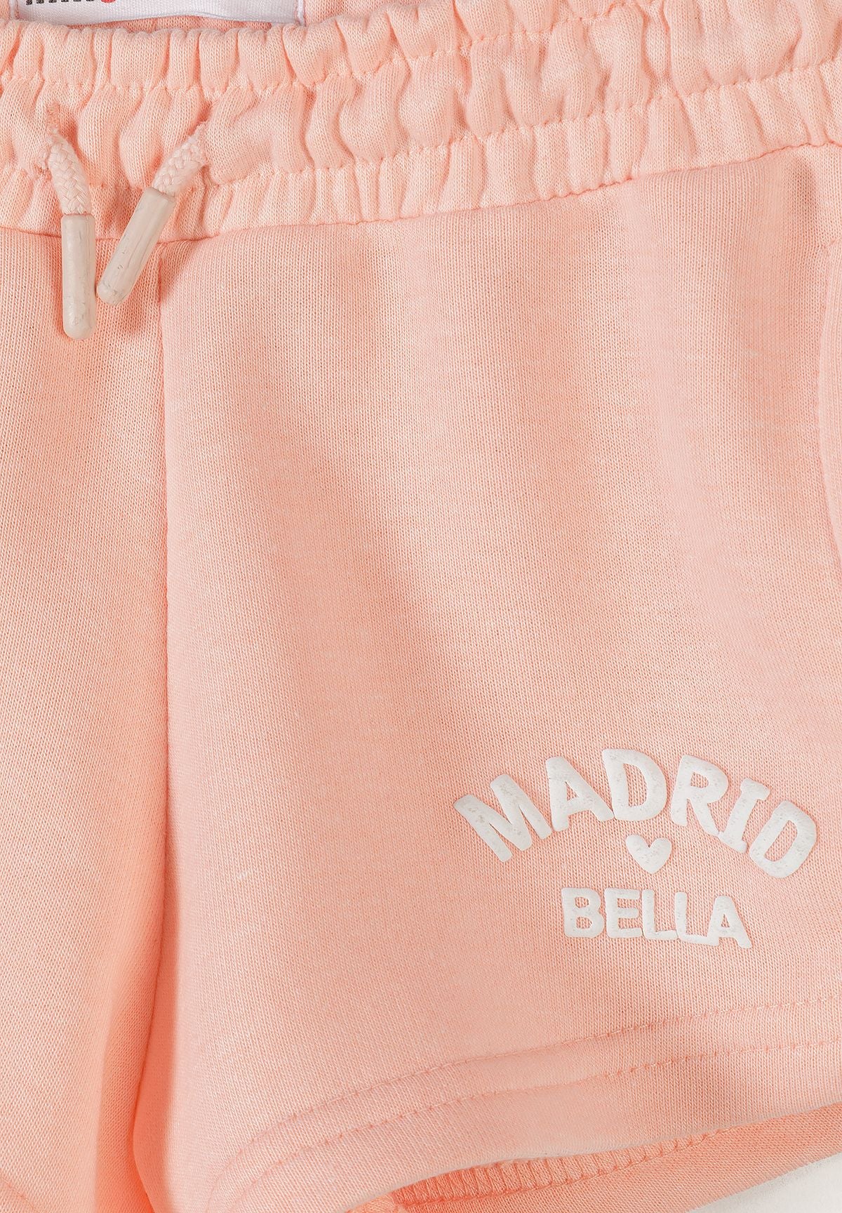 Peach sweatshirt and shorts set, shorts detail.