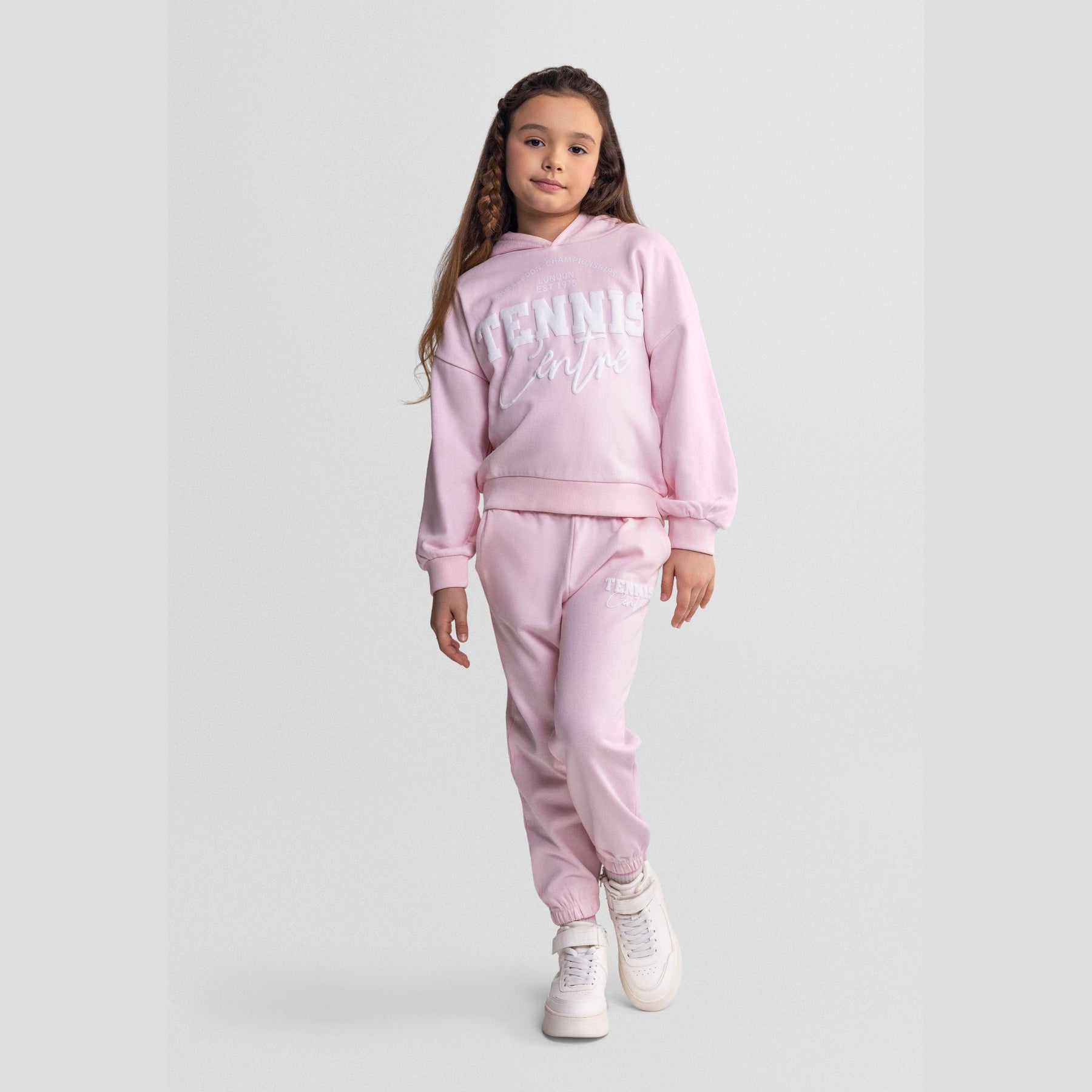 Light pink hooded sweatshirt with Tennis Camps white print, flat lay product shot on white background