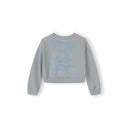 Light blue cropped sweatshirt laid flat showing California embroidered graphic with palm tree design on back