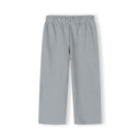 Close-up detail of light blue fabric showing small embroidered California palm tree graphic near neckline