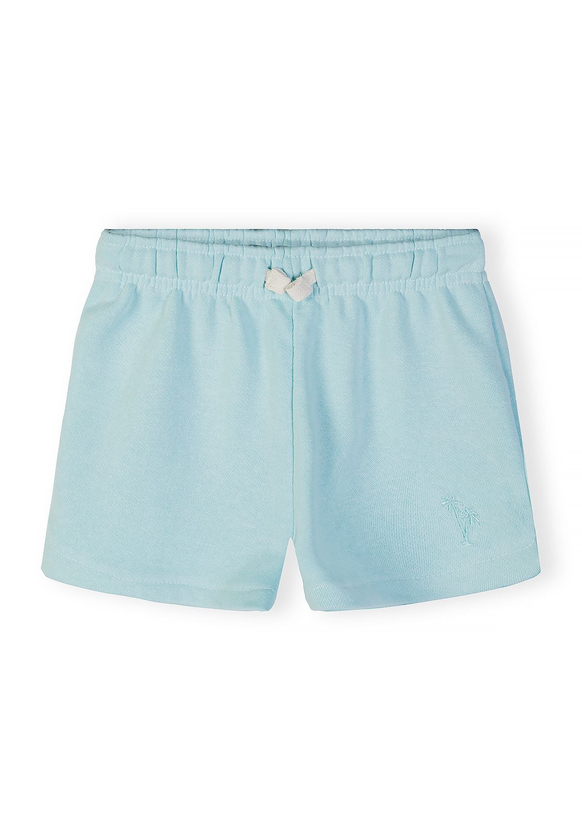 Detail of light blue girls' shorts with elastic waistband and embroidered design.