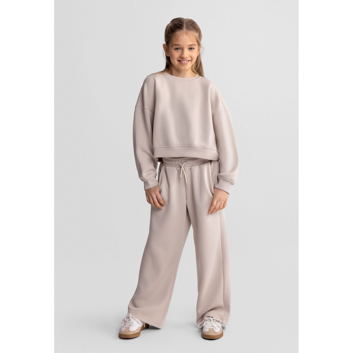 Girls' wide-leg drawstring trousers in beige — complete product view for square Shop card