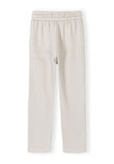 Off white wide leg joggers for girls with elasticated waist, featuring a soft viscose blend fabric design.