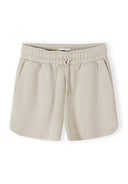 Beige women’s shorts with elasticated waist and drawstring, featuring a soft, smooth viscose blend fabric design.