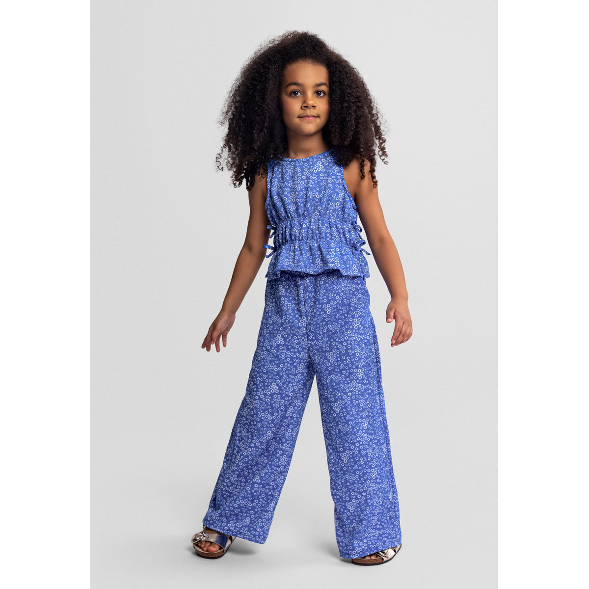 Girls' floral top and wide leg trousers set in blue and white — complete product view for square Shop card