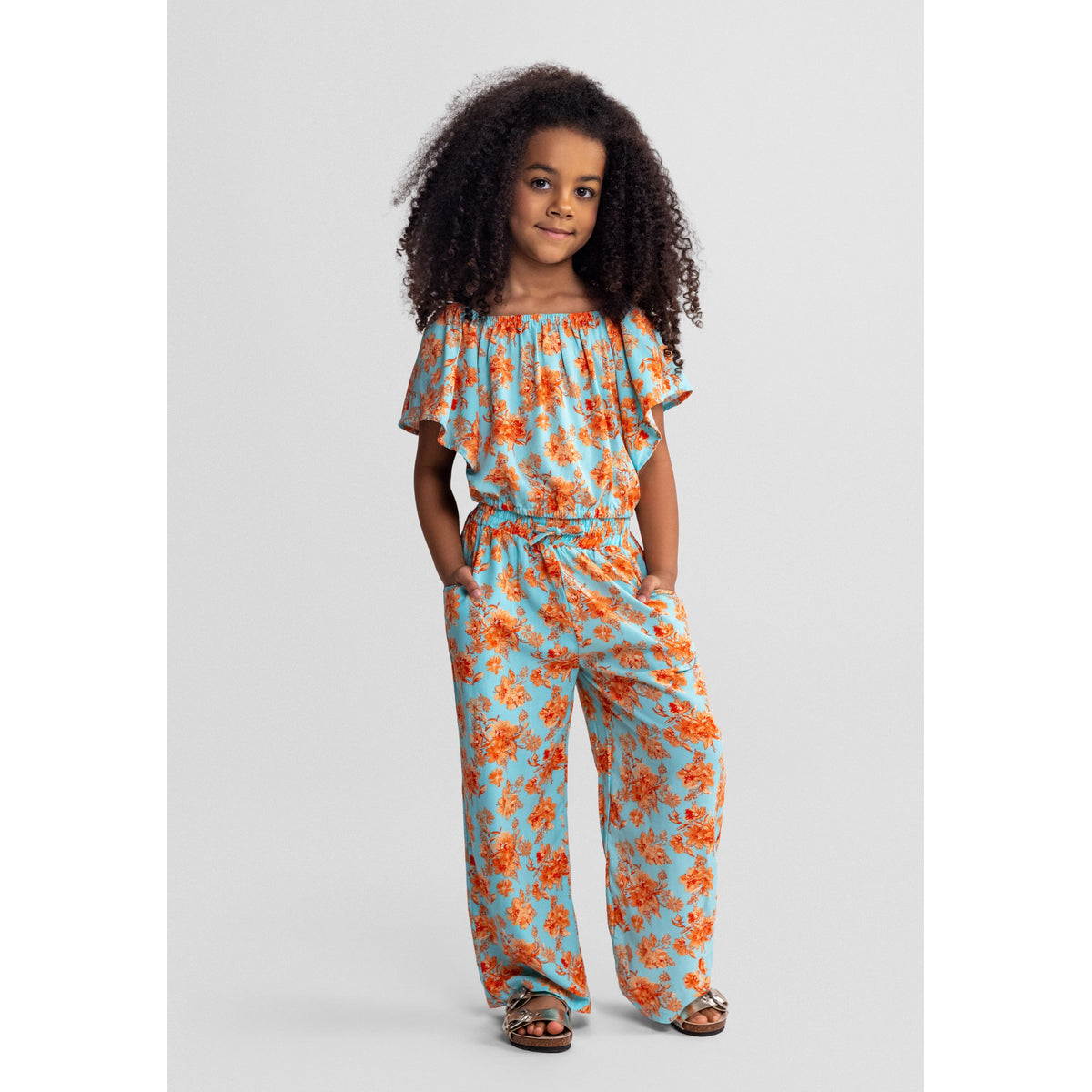 Girls' floral top and wide leg trousers set in light blue and orange — complete product view for square Shop card
