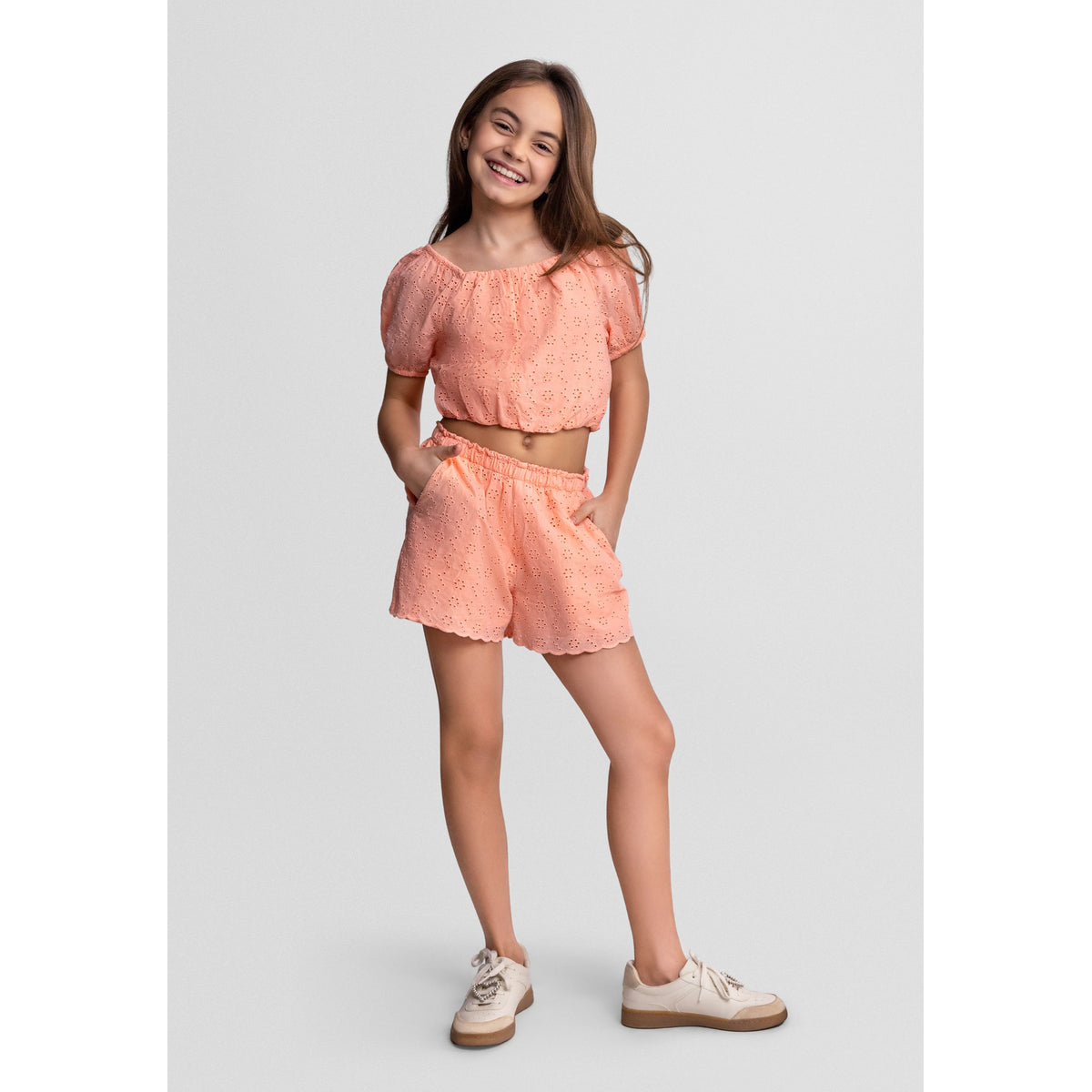 Girls' broderie top and shorts set in peach — complete product view for square Shop card