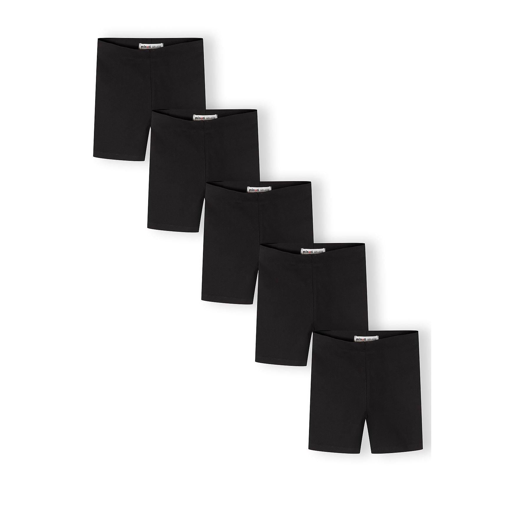 Five black cycling shorts arranged in overlapping diagonal layout on white background showing Minoti brand labels