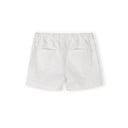 Close-up detail of white twill shorts showing button fastening, drawstring ties and fabric texture against neutral background