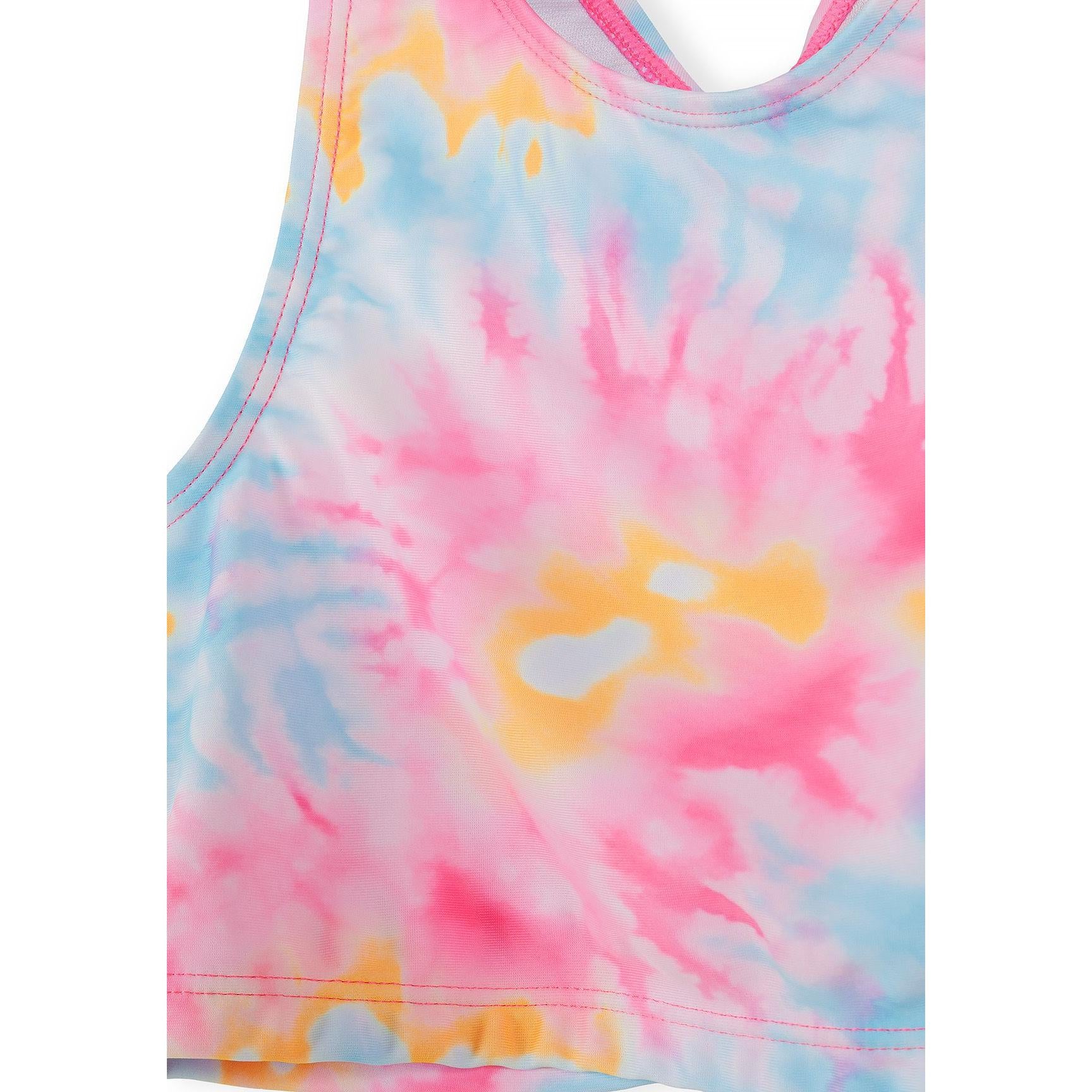 Tie-dye bikini bottom with ruffled side details in matching pink and blue pattern, shown from back view on white background