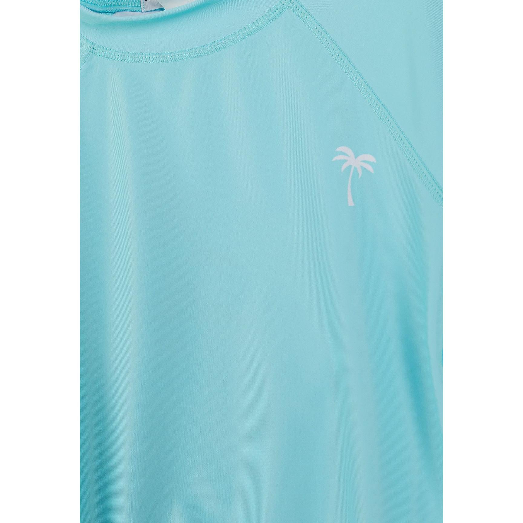 Close-up detail of aqua blue swim t-shirt showing small white palm tree embroidered logo on chest area