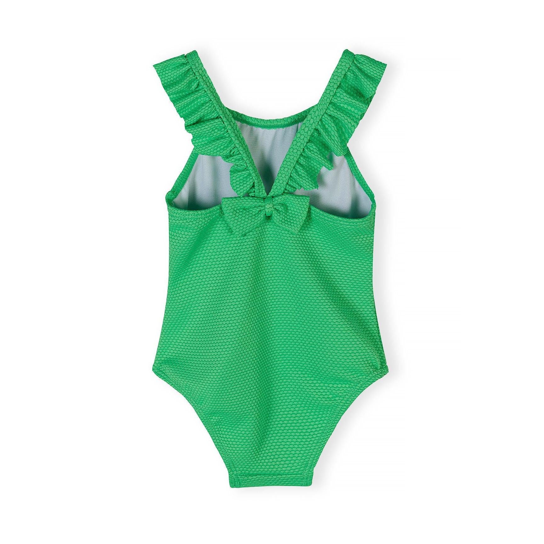 Back view of neon green swimsuit showing decorative bow detail and cut-out design with ruffle straps