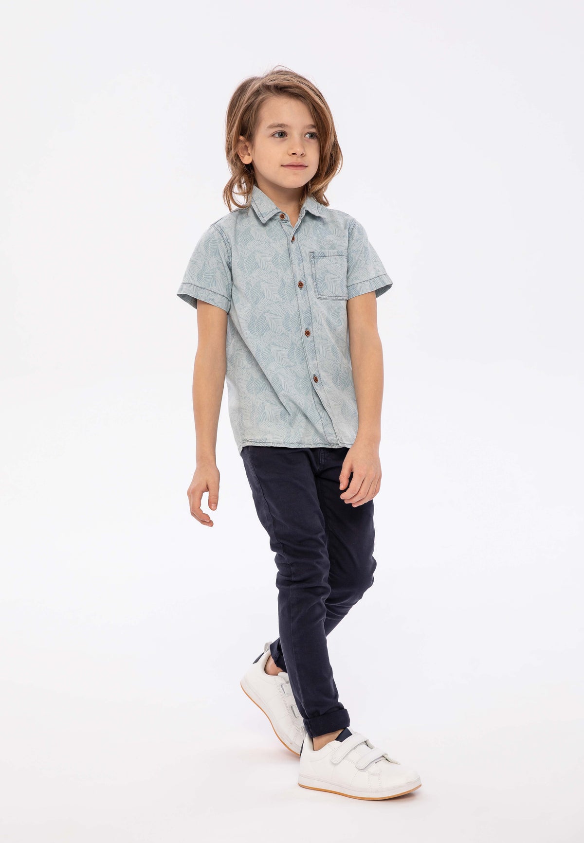 Light blue shirt, worn front.