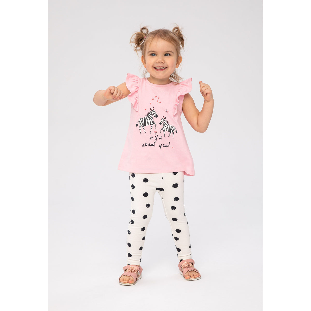 Girls' frill top and leggings set in pink and white — complete product view for square Shop card
