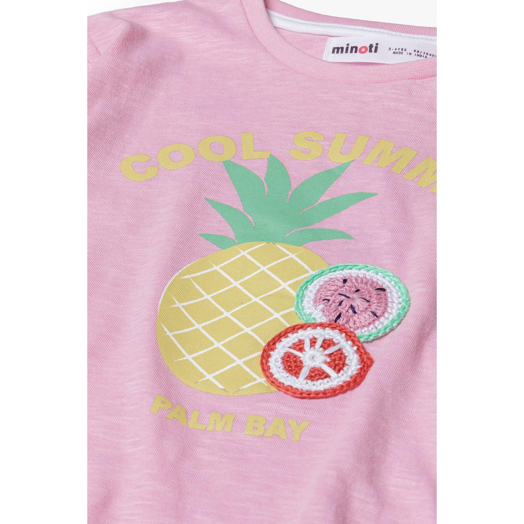 Close-up detail of Cool Summer crochet applique featuring pineapple with green leaves and colorful fruit slices on light pink fabric