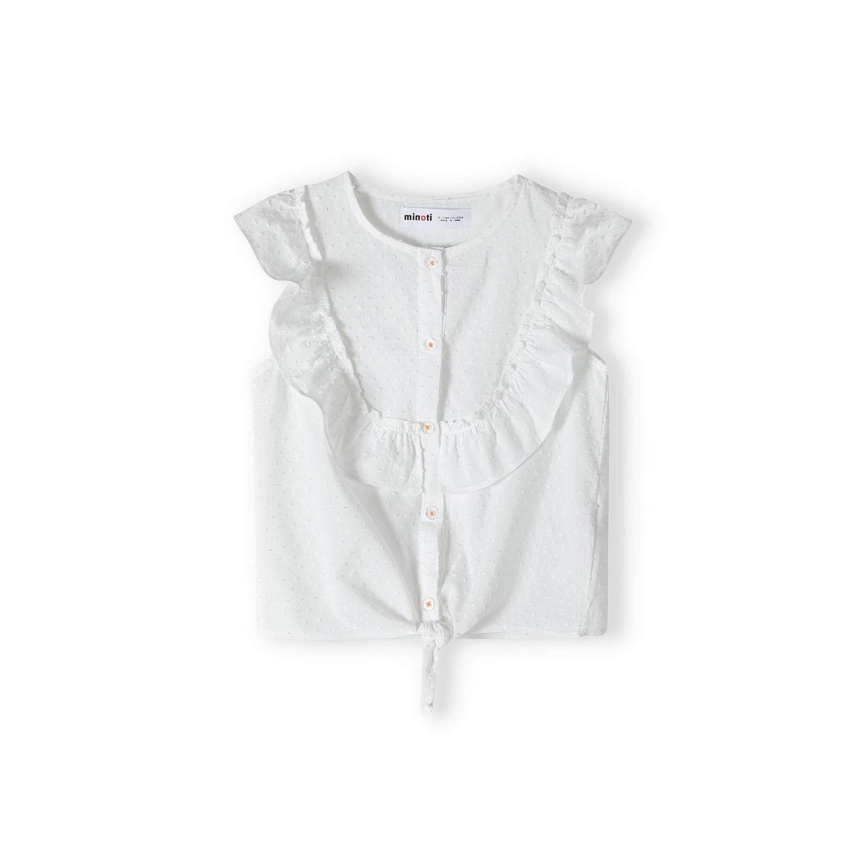 White broderie anglaise sleeveless top laid flat showing back view with ruffle cap sleeves and tie detail at bottom hem