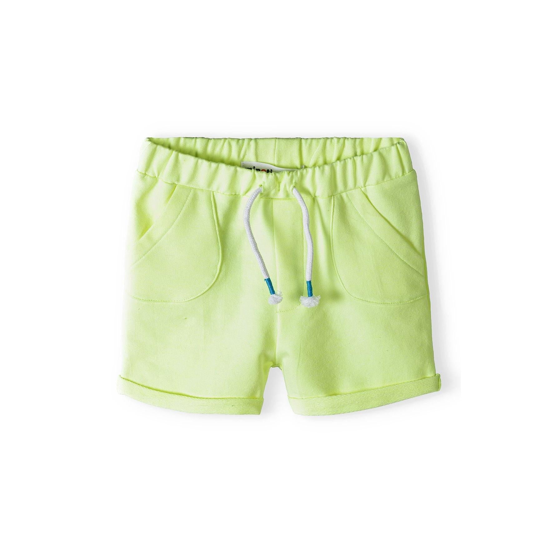 Lime green fleece shorts laid flat showing elasticated waistband and rolled hem cuffs on white background