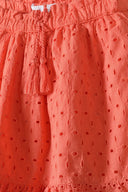 Girls broderie anglaise skirt paper bag waist orange 3-14y with textured broderie fabric and tassel drawcord for adjustable fit.