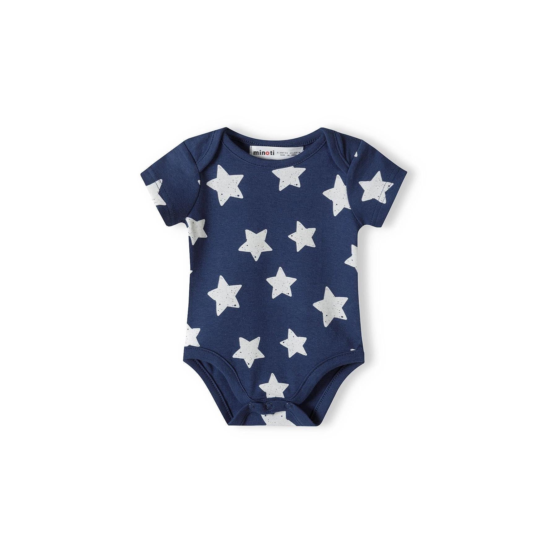 Single white bodysuit with navy blue micro star pattern displayed flat showing back view with envelope neckline on white background