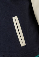 Boys baseball jacket in navy blue with cream zipper and green embroidery