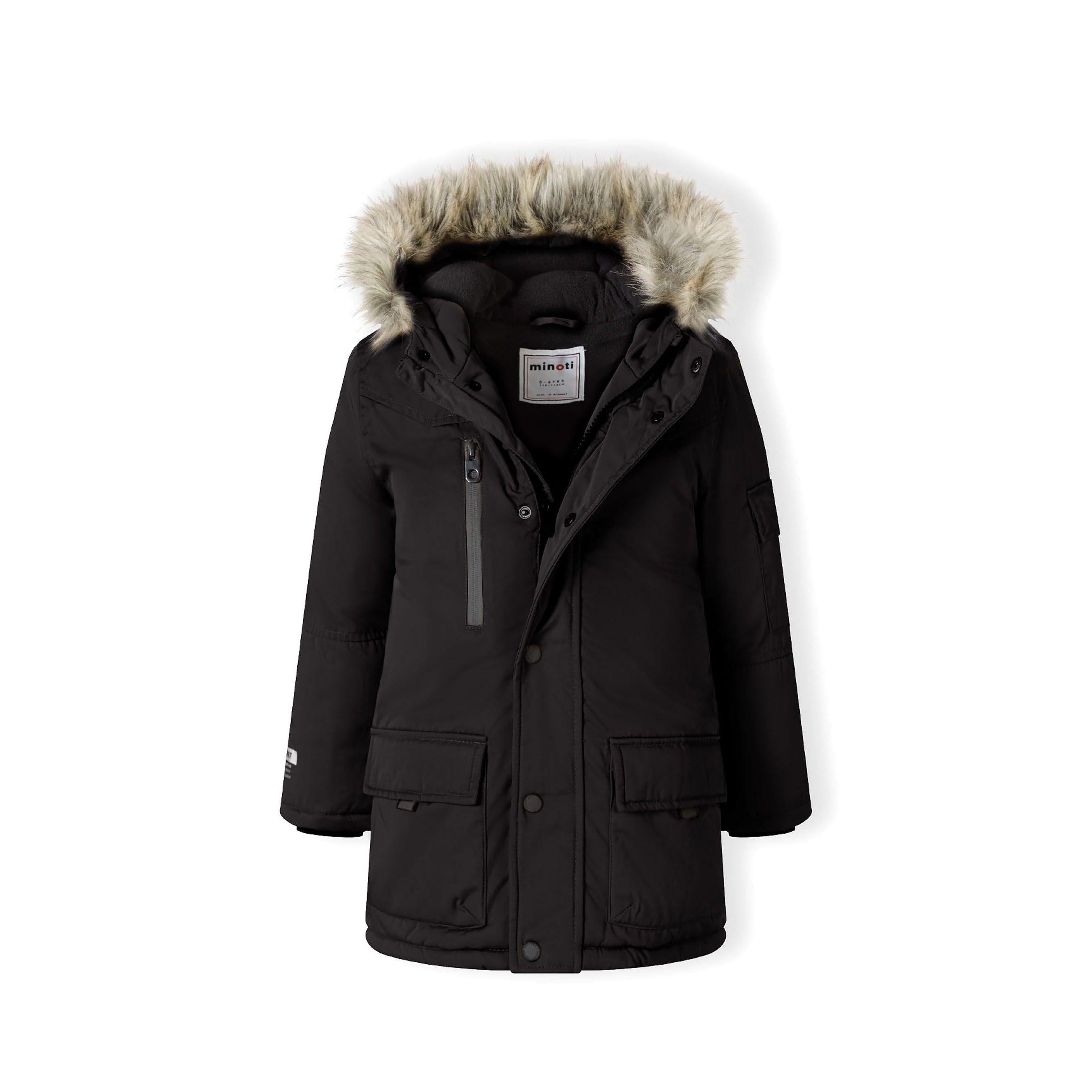 Close-up detail of black parka hood with grey faux fur trim showing attachment buttons and fabric texture