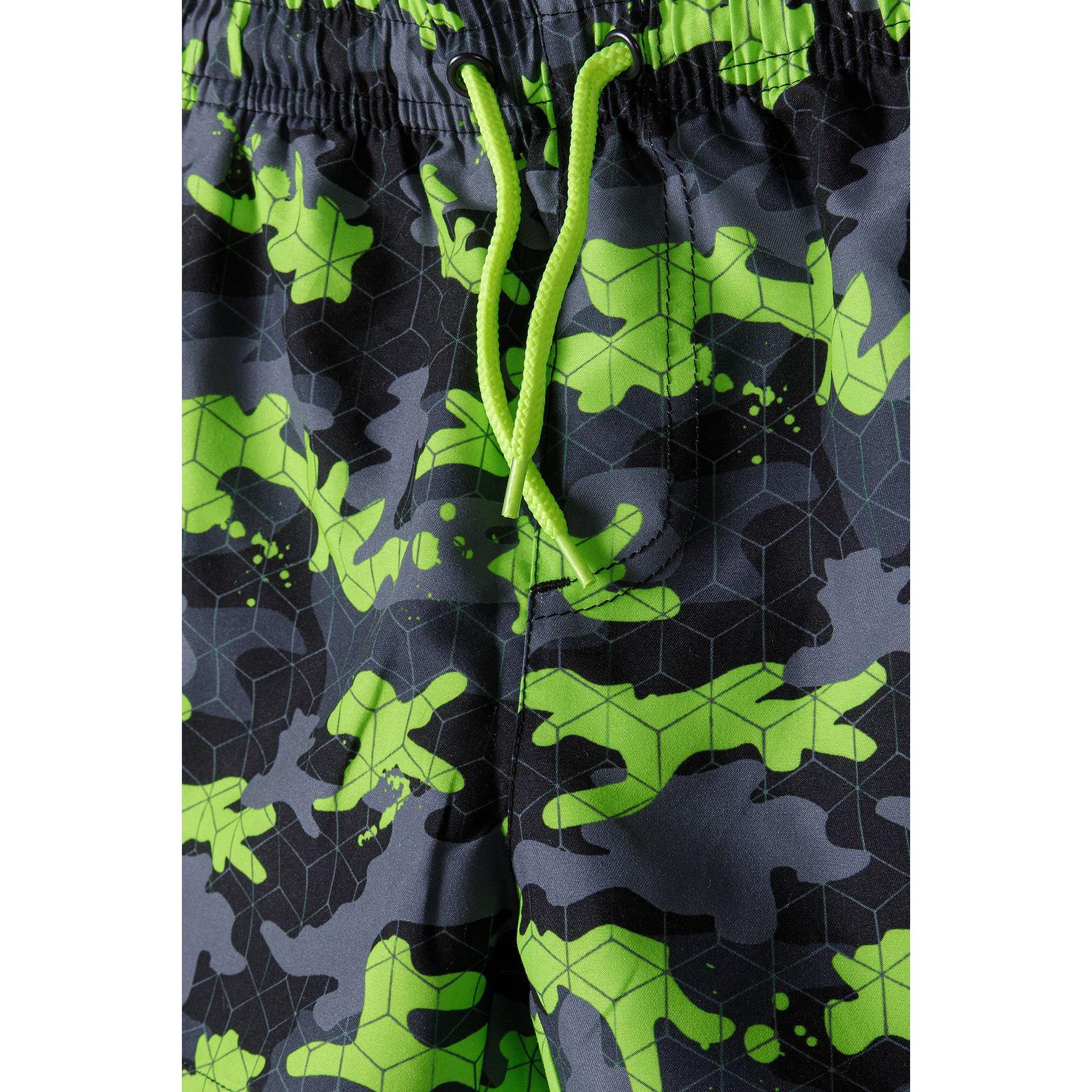 Close-up detail of bright green drawstring ties and elasticated waistband on camouflage print fabric