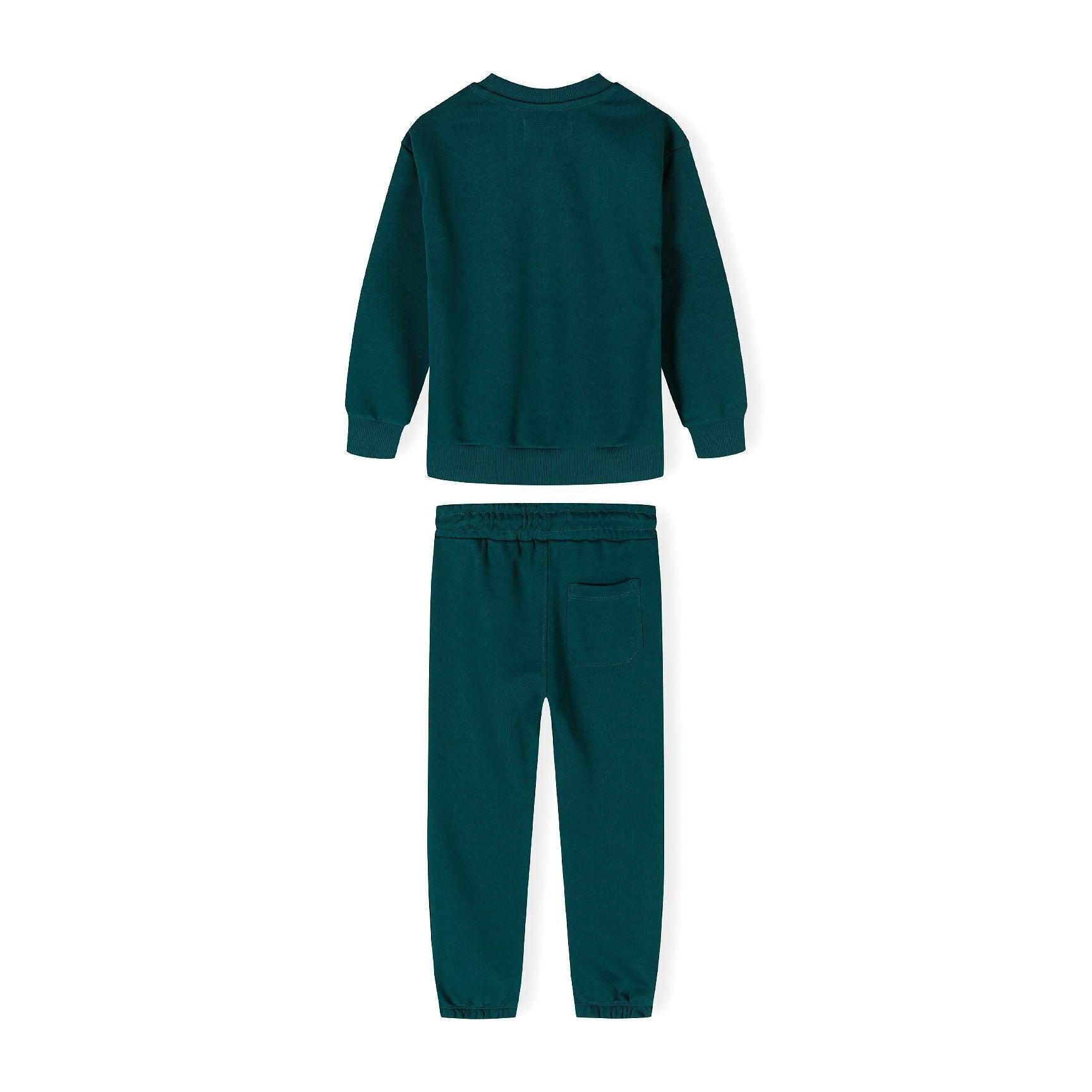 Close-up detail of dark green joggers showing elasticated waistband with drawstring and Los Angeles District white text print