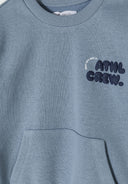 Boys crew neck sweatshirt with kangaroo pocket blue 1-8y featuring a soft cotton texture and decorative print on the front.