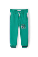 Boys fleece jogpant in applique dark green with teal sweatpants, white stripes, and M logo