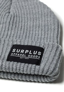 Gray rib knitted boys beanie hat with black surplus apparel label