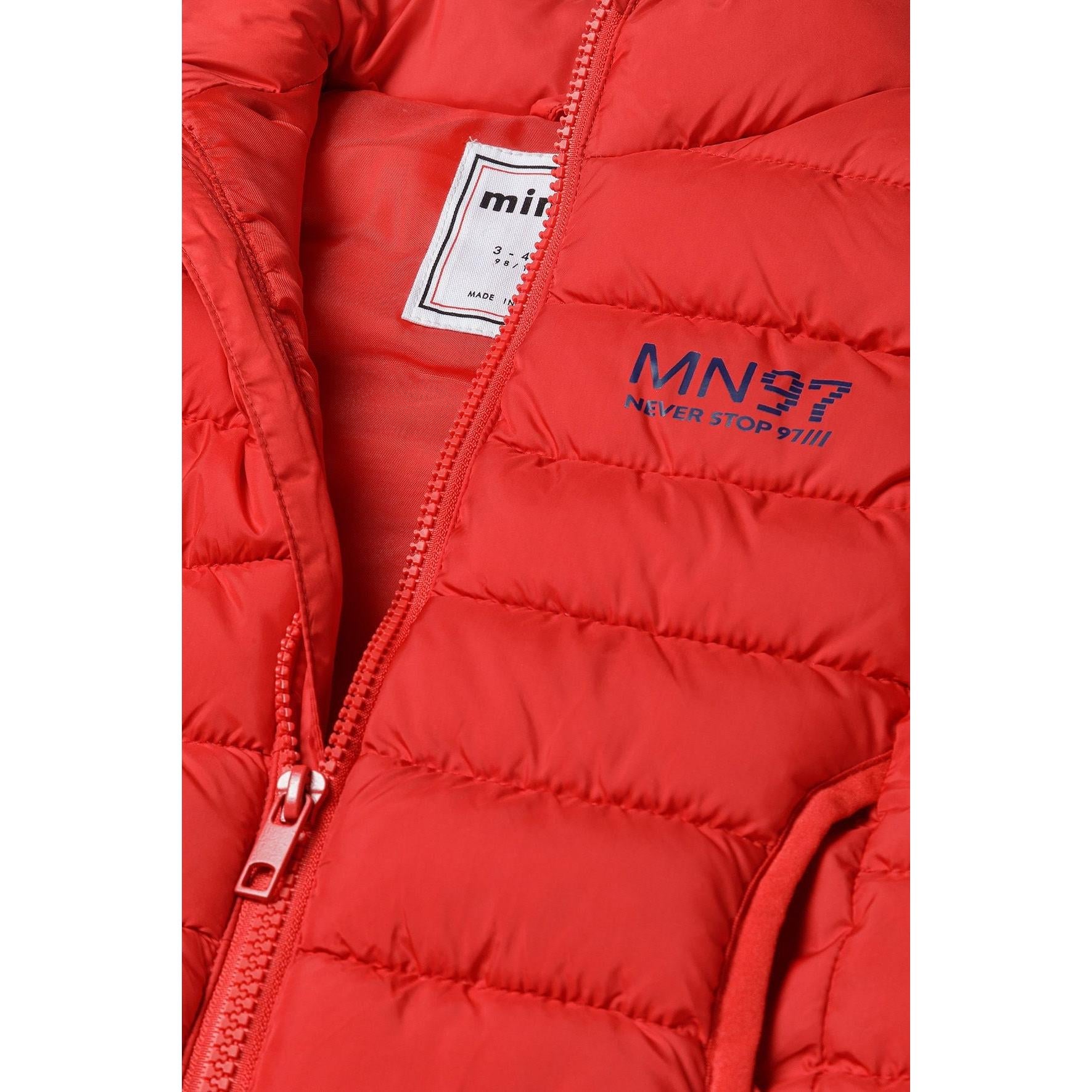 Close-up detail of red gilet showing zip fastening, Minoti label and chest print with contrast trim details