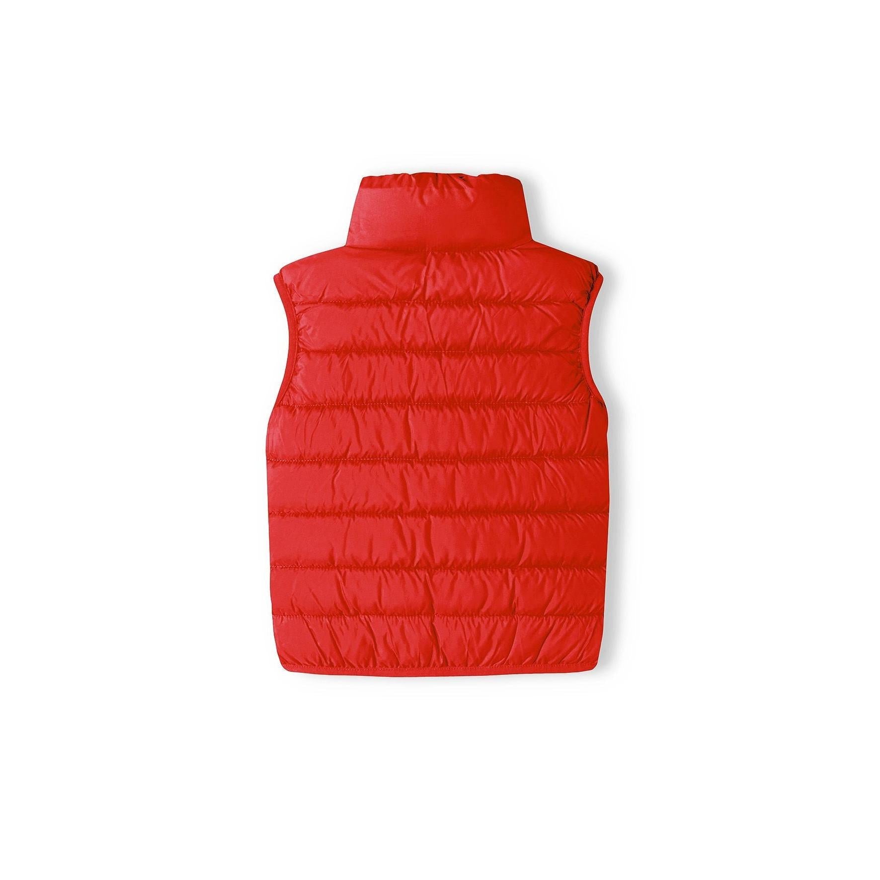 Flat lay of red padded gilet showing quilted construction, stand collar and sleeveless design on white background