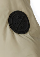 Boys beige padded jacket with mnt 97 logo on raglan sleeve